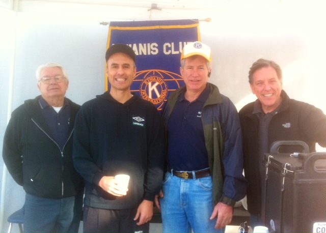 Bruce Irwin, Miguel Iriarte, Gerry Poulin and John Vandercook serving coffee, hot chocolate and coffee cake at the Annual Tiger Run